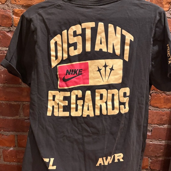Nike/Drake Rare “Distant Regards” Nocta Green & Gold Turks & Caicos Graphic Tee - Picture 1 of 3